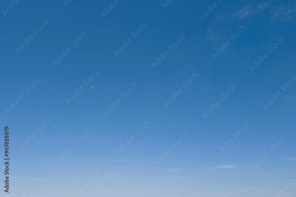 Clear blue sky with no clouds, showcasing a serene and uninterrupted horizon. Clear blue sky with no clouds, showcasing a serene and uninterrupted horizon.