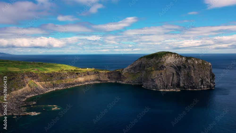 Aerial view of the beautiful rugged cliffs and serene blue ocean, Faial, Azores, Portugal. Aerial view of the beautiful rugged cliffs and serene blue ocean, Faial, Azores, Portugal.
