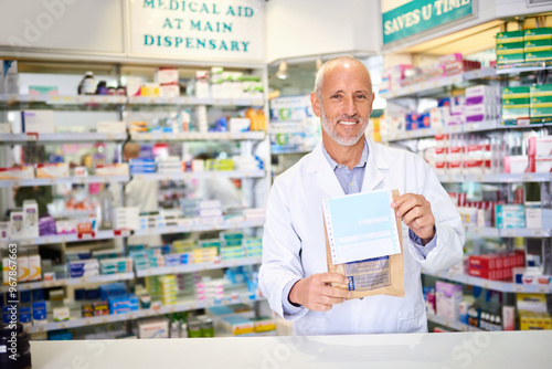 Portrait, pharmacy and happy man with prescription medicine in paper bag for healthcare service. Mature pharmacist, face or medical professional with product, drugs or magnesium supplements for cure