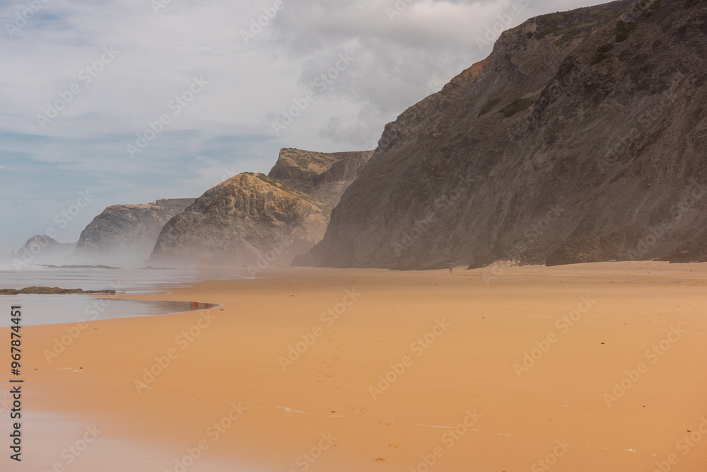 Sandy beach on Atlantic Ocean in Algarve, Portugal