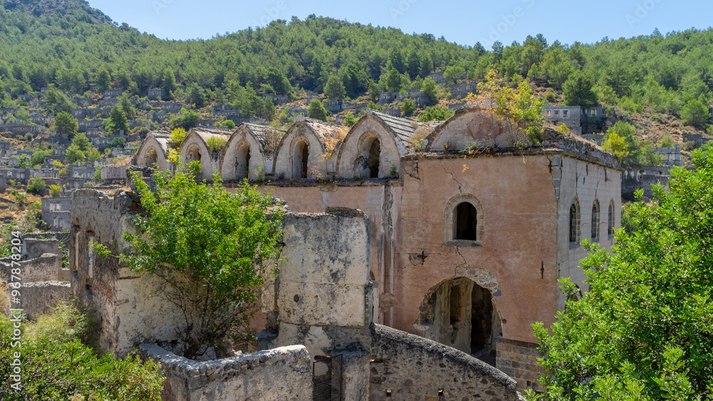 Fototapeta premium Abandoned church in abandoned town or village Kayakoy, neighbourhood of municipality and district of Fethiye, Mugla Province, Turkey