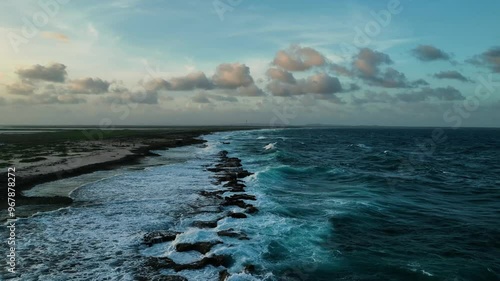 Aerial view of a beautiful tropical reef and serene coastline at sunrise, Caribbean, Netherlands.