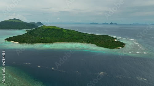 Aerial view of a beautiful tropical island with a pristine lagoon and lush palms, Shefa Province, Vanuatu. photo