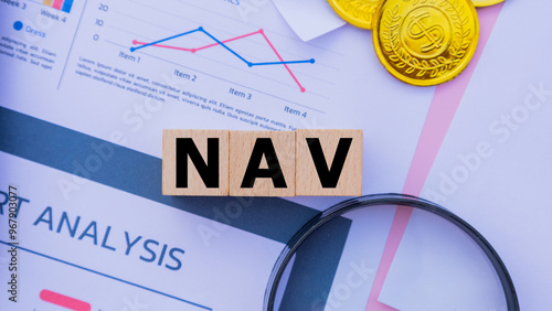 Wooden cube with the word NAV. It is an abbreviation of Net Asset Value. Business profitability success growth profitability analytics. Business and financial market concept.