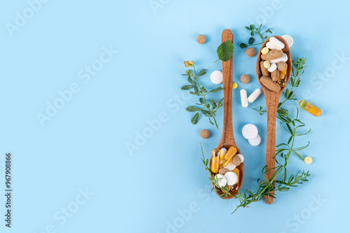 Obraz na plátně Homeopathic medicine pills, various colorful medicine pills and capsules, dietary supplements with herbs and plants