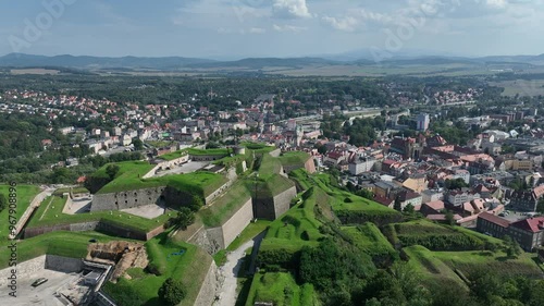 Klodzko Fortress (German: Festung Glatz) – a preserved fortress in Klodzko, a defense system from the 17th and 18th centuries in Poland. Aerial drone view of Klodzko Fortress and town Klodzko photo