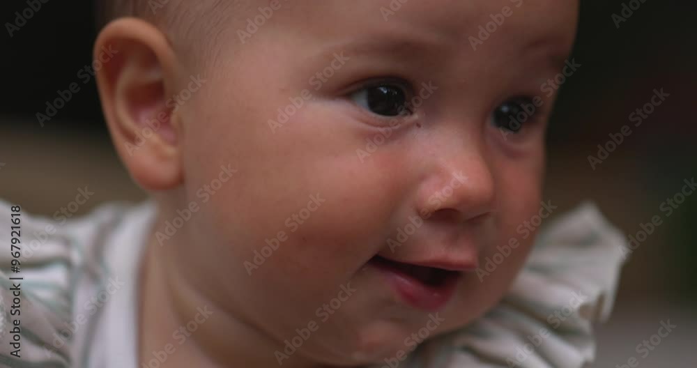 Infant baby with milk running down mother - close up on face Infant baby with milk running down mother - close up on face
