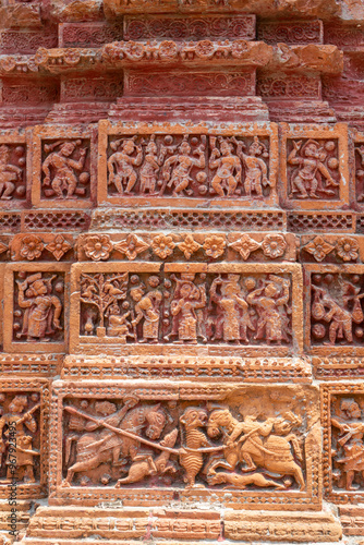 Obraz na płótnie column decorated with terracotta carvings in Pancha Ratna Govinda Temple, Rajshahi District, Puthia, Bangladesh. w salonie