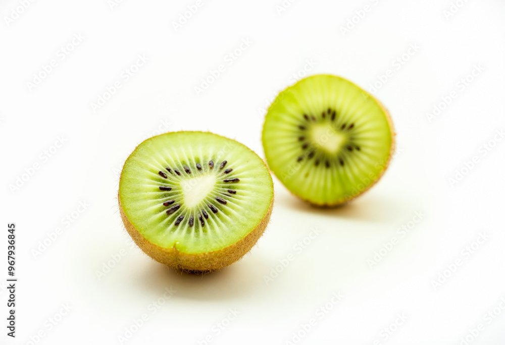 Two Kiwi Fruit Halves on White Background Tropical Fruit Healthy Eating Green Fresh Vitamin C Sweet Tart Juicy Snack Refreshing Exotic Ingredient Delicious Food Photography Two Kiwi Fruit Halves on White Background Tropical Fruit Healthy Eating Green Fresh Vitamin C Sweet Tart Juicy Snack Refreshing Exotic Ingredient Delicious Food Photography