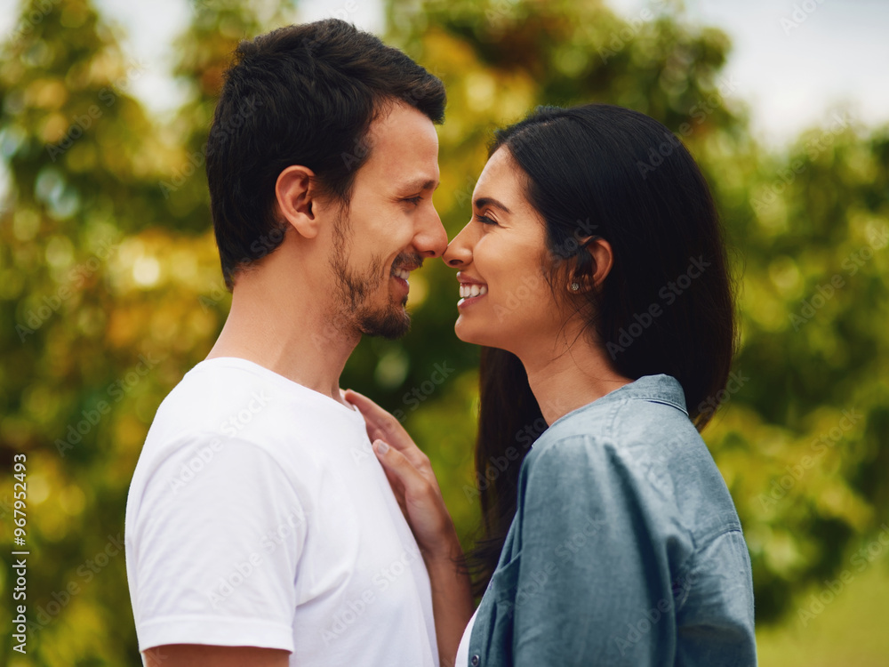 Fototapeta premium Love, peace and smile with couple in park for romance, bonding and summer vacation. Happiness, commitment and care with man and woman relax on date in nature for marriage, support and partnership