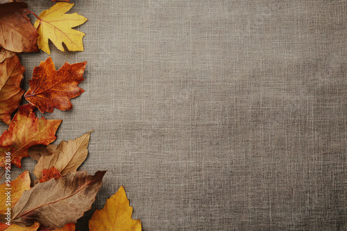 Autumn leaves on a table with room for text