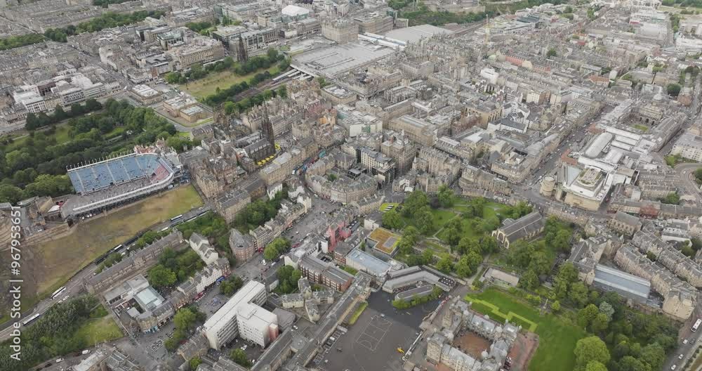 Aerial view of edinburgh castle surrounded by beautiful greenery and historic buildings, edinburgh, united kingdom. Aerial view of edinburgh castle surrounded by beautiful greenery and historic buildings, edinburgh, united kingdom.