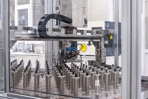 Close up view of a high technology automation machine in a factory, or testing center, or research and development laboratory.