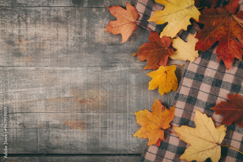 Autumn leaves on a table with room for text