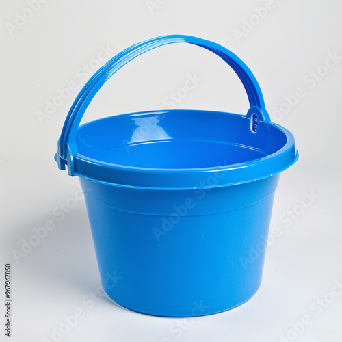 a blue toy bucket on solid white background 