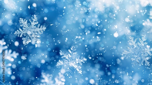 Magical blue winter snowflakes background for christmas cards and holiday promotions