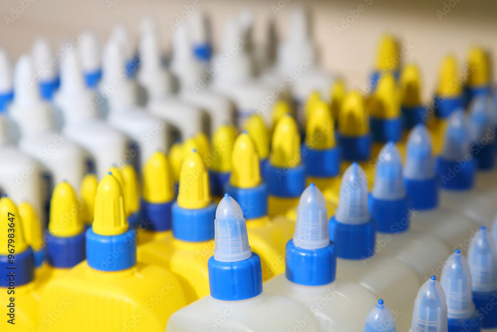 Stationery glue. School supplies, stationery accessories. Office glue. Colorful stationery. Goods for office and study. Stationery glue. School supplies, stationery accessories. Office glue. Colorful stationery. Goods for office and study.