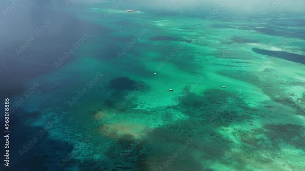 Aerial view of Alacranes Reef with turquoise water and pristine beach, Progreso, Mexico. Aerial view of Alacranes Reef with turquoise water and pristine beach, Progreso, Mexico.
