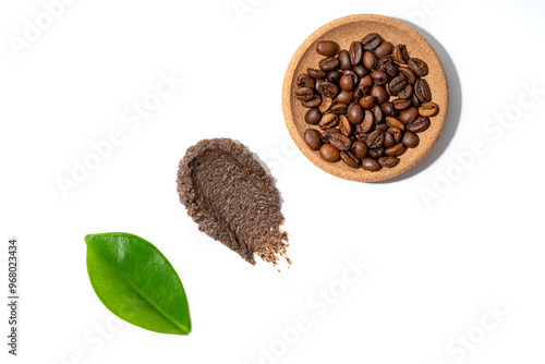 Homemade coffee scrub and beans isolated on white background