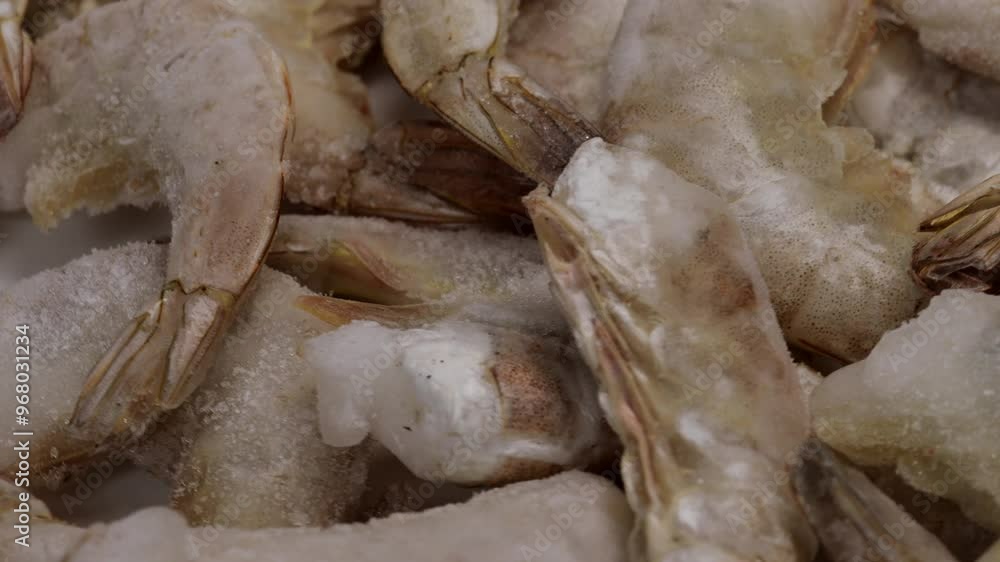 raw frozen shrimp, rotation in circle. Fresh Shrimp Tails, Turning. grey raw shrimp in a shell raw frozen shrimp, rotation in circle. Fresh Shrimp Tails, Turning. grey raw shrimp in a shell
