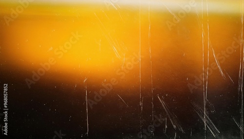 Golden Hued Abstract Texture with Light Scratches and Dark Gradient. Warm, Atmospheric Banner Background With Copy Space Ideal for Vintage Effects, Film, or Artistic Design