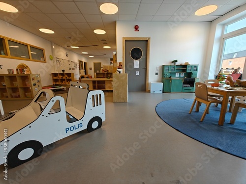 Stylish and comfortable European kindergarten for small children, classroom. Daycare playing room, playroom, game room.