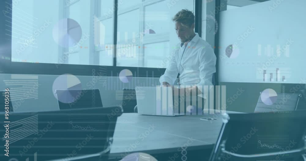 Animation of financial data processing over caucasian businessman using tablet in office Animation of financial data processing over caucasian businessman using tablet in office