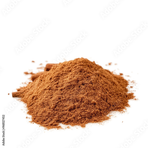 A pile of ground cinnamon sits on a table, ready to be used for baking or cooking.