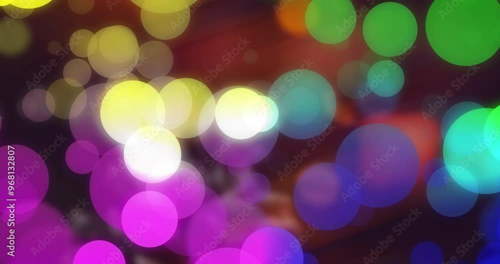 Animation of colourful spots on black background Animation of colourful spots on black background