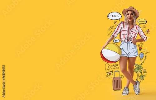 Young woman with beach ball...