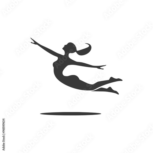 Silhouette of a woman with arms outstretched jumping over a circle