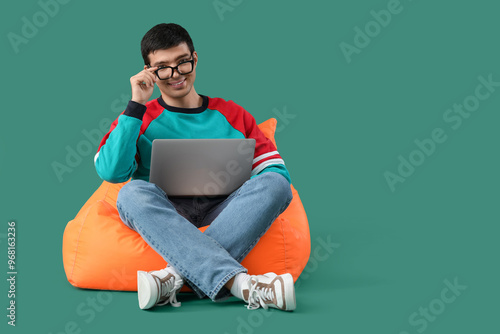 Male programmer with laptop...