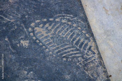 dirt footprint on rubber black surface