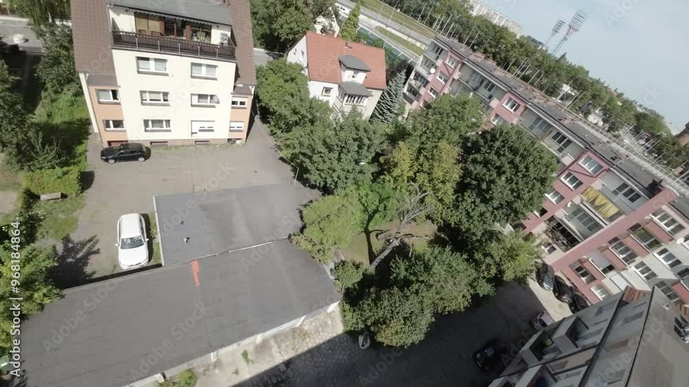 This captivating aerial video showcases a stunning cityscape , offering a birds eye view of the harmonious blend between urban structures and green spaces. The video begins by soaring above the city This captivating aerial video showcases a stunning cityscape , offering a birds eye view of the harmonious blend between urban structures and green spaces. The video begins by soaring above the city