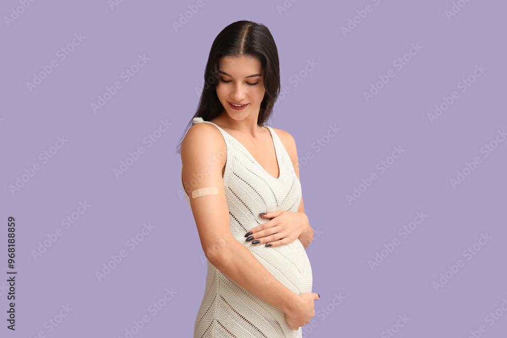 Young pregnant woman after vaccination on lilac background Young pregnant woman after vaccination on lilac background