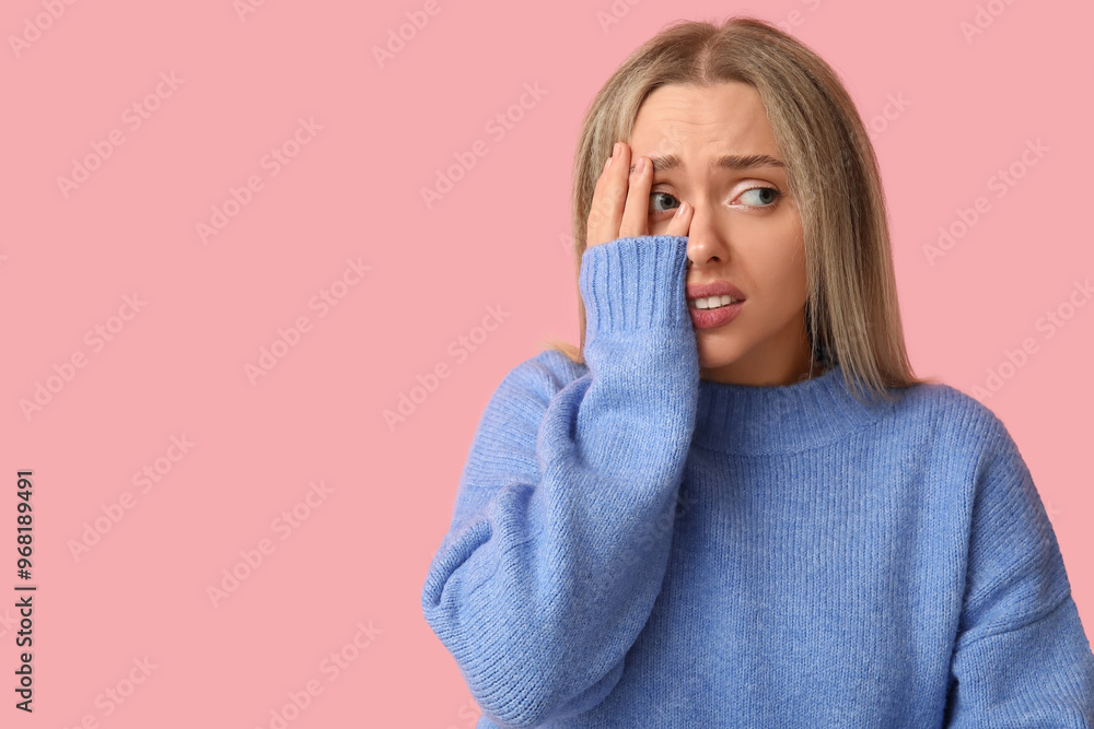 Embarrassed young woman on pink background Embarrassed young woman on pink background