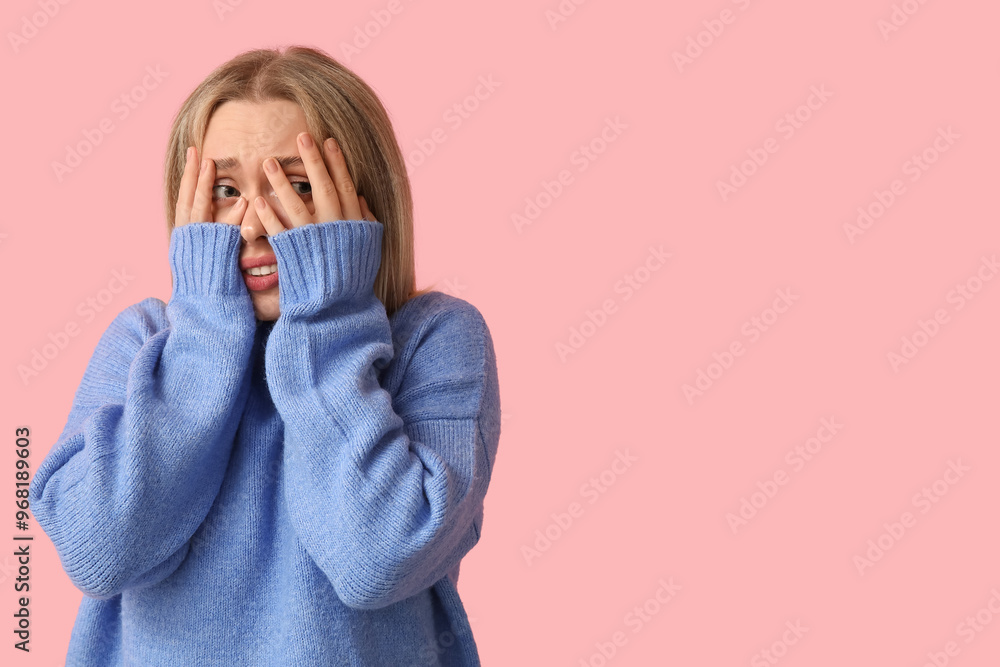 Embarrassed young woman on pink background Embarrassed young woman on pink background