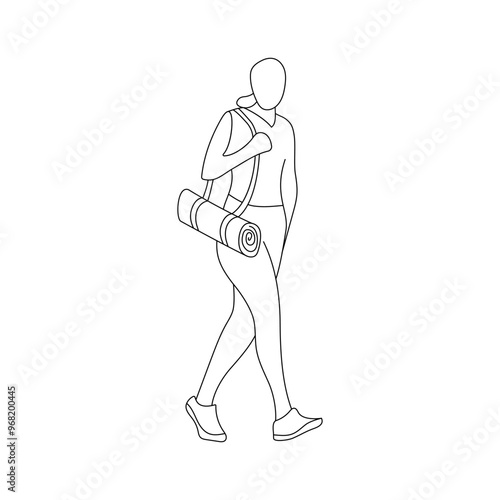 Person walking with a yoga mat, heading to a fitness class in a sunny urban environment