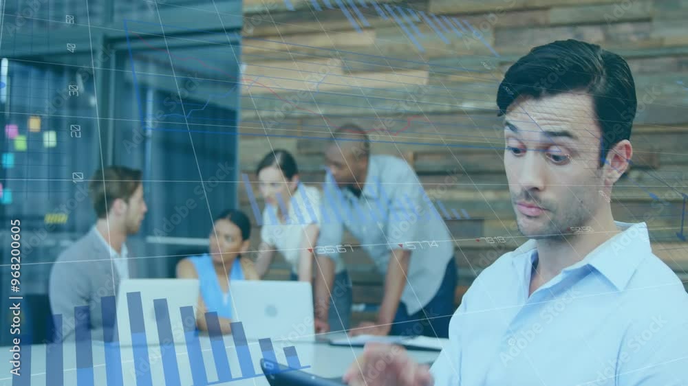 Animation of financial data processing over caucasian businessman using tablet in office Animation of financial data processing over caucasian businessman using tablet in office