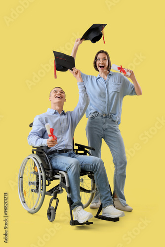 Male graduate in wheelchair...