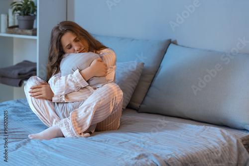 Stressed young woman with p...