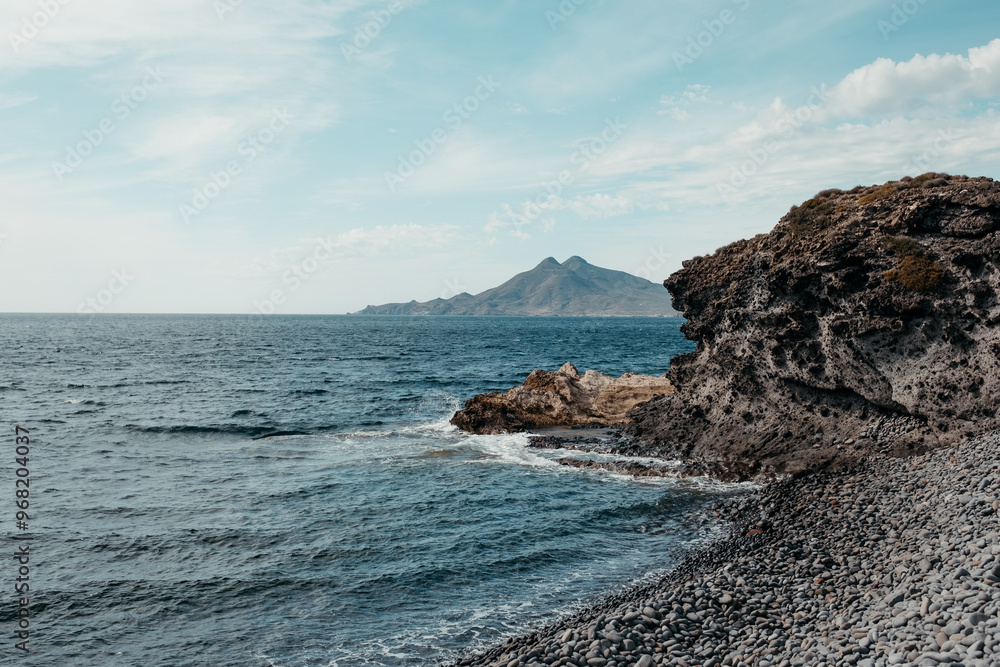 Rugged coastline and serene sea at Carnaje Rugged coastline and serene sea at Carnaje