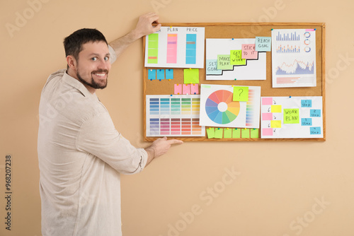 Young man with business pla...
