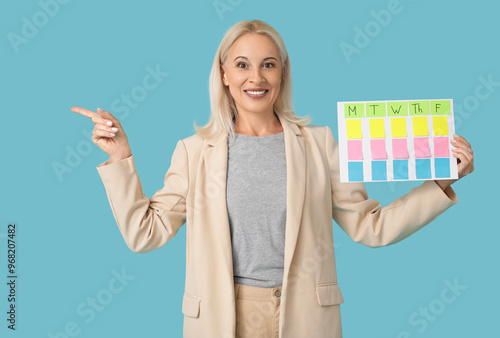 Mature woman with business ...