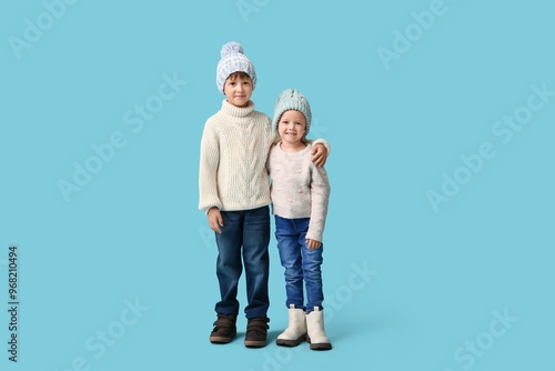 Happy brother and sister in...