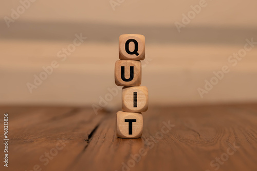 Quiet Quitting. Cubes form the word Quiet Quitting. photo