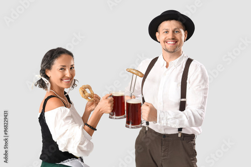 Happy mature waiters in tra...