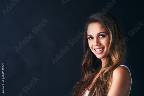 Portrait, woman and fashion with confidence, hair care or positivity on black background. Female person, style and trendy in mockup space as satisfied or casual in outfit, clothes and pride as model