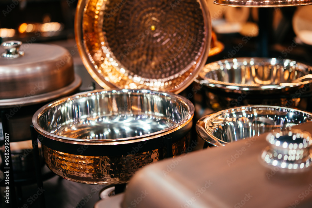 Copper chafing dishes for the luxury banquet in a restaurant or hotel. Copper chafing dishes for the luxury banquet in a restaurant or hotel.