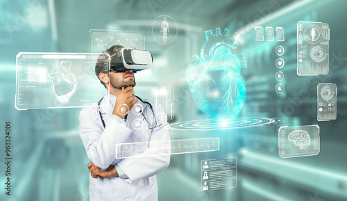 Quadro em tela Professional doctor wearing lab coat and VR headset while looking at hologram of human organ